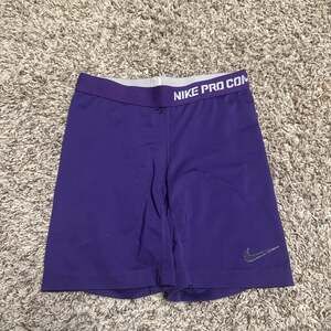 Nike Pro Women's 3-Inch Dri-FIT Mid-Rise Compression Training Shorts in Purple